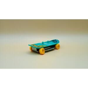 ILLUSIVE 'SKATE GROM" RACER 1:64 SCALE MFG 2013 NOFIGURINE ON A SKATEBOARD